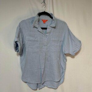 Woman’s muslin style collared shirt. Size medium. Light blue. Relaxed fit.